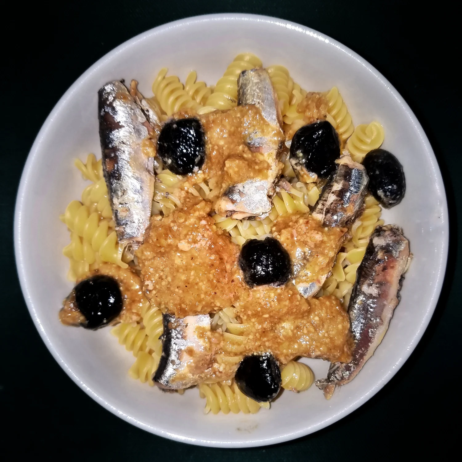 Pasta tossed with walnut pesto